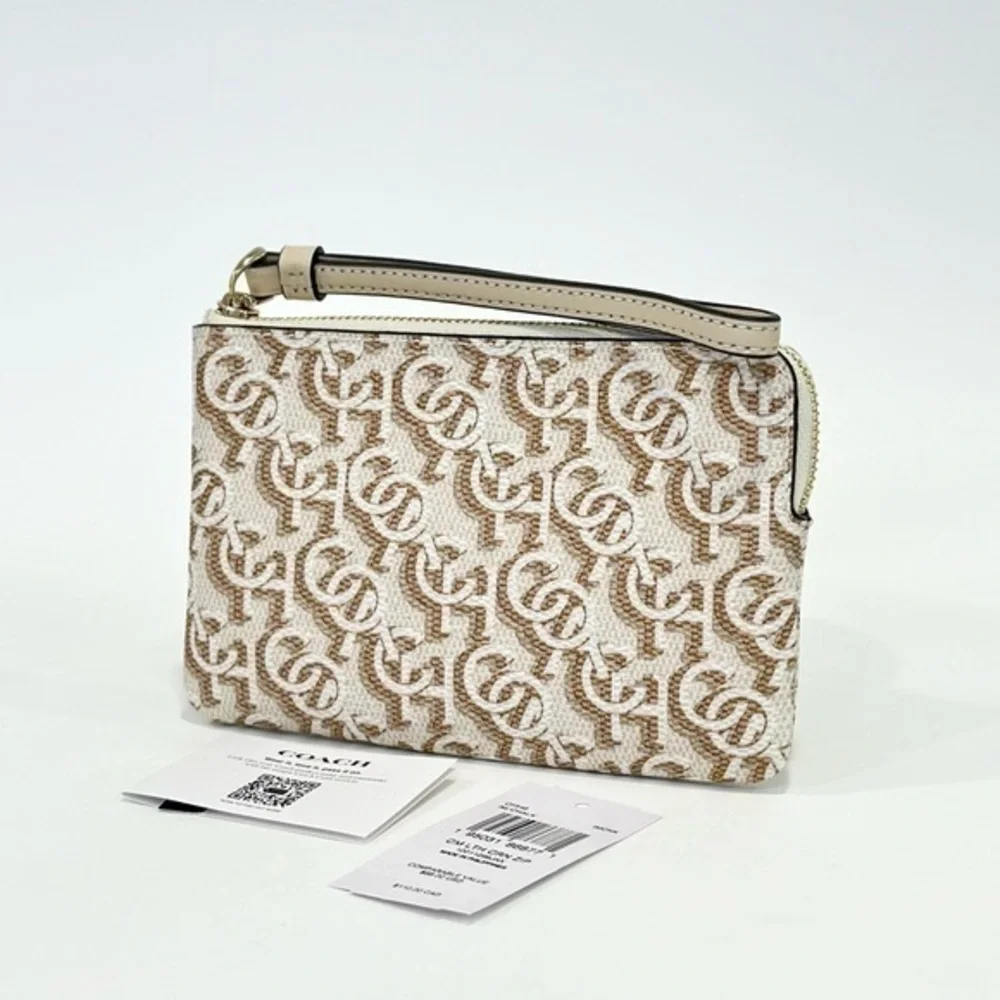 COACH CORNER ZIP WRISTLET WALLET WITH SIGNATURE MONOGRAM PRINT IN CHALK